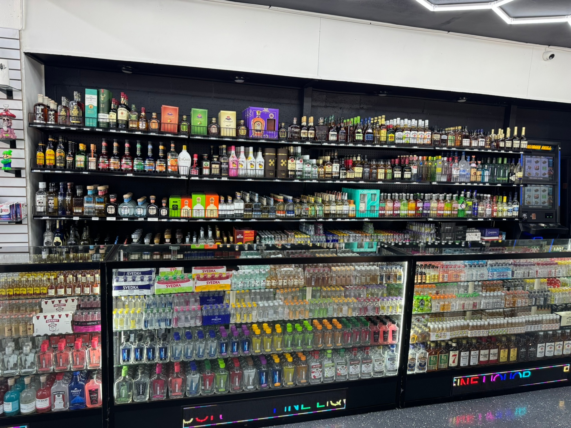 Top-shelf whiskey, tequila and miniatures wall